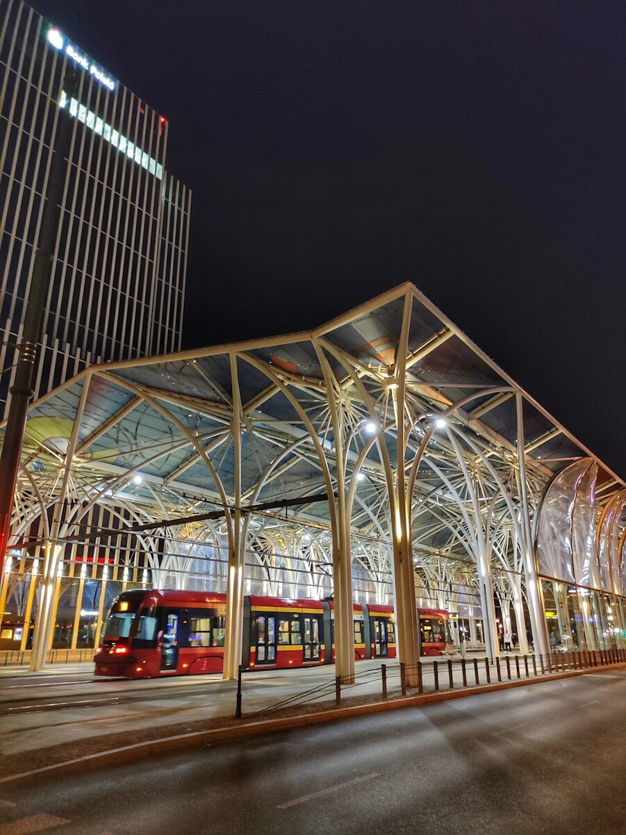 a train station with a train on the tracks