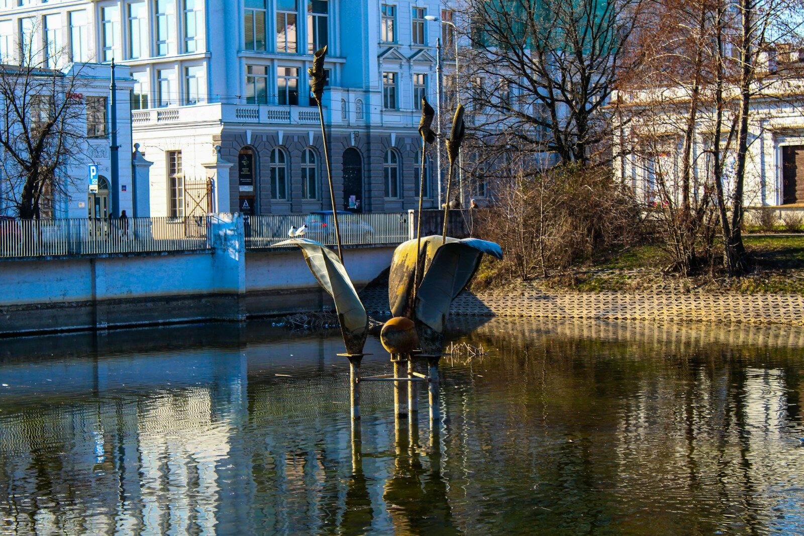 a boat sitting in the middle of a body of water