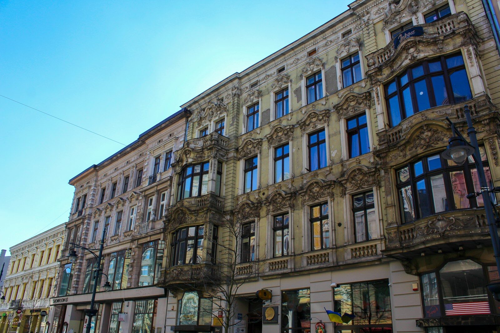 a large building with many windows on the side of it